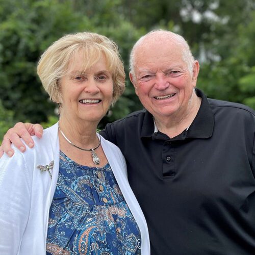 Photo of Judie Pfeifer and Bill Lunney in a park