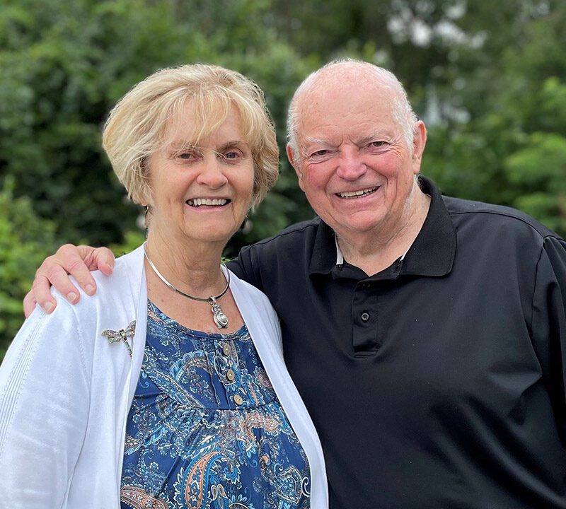Photo of Judie Pfeifer and Bill Lunney in a park