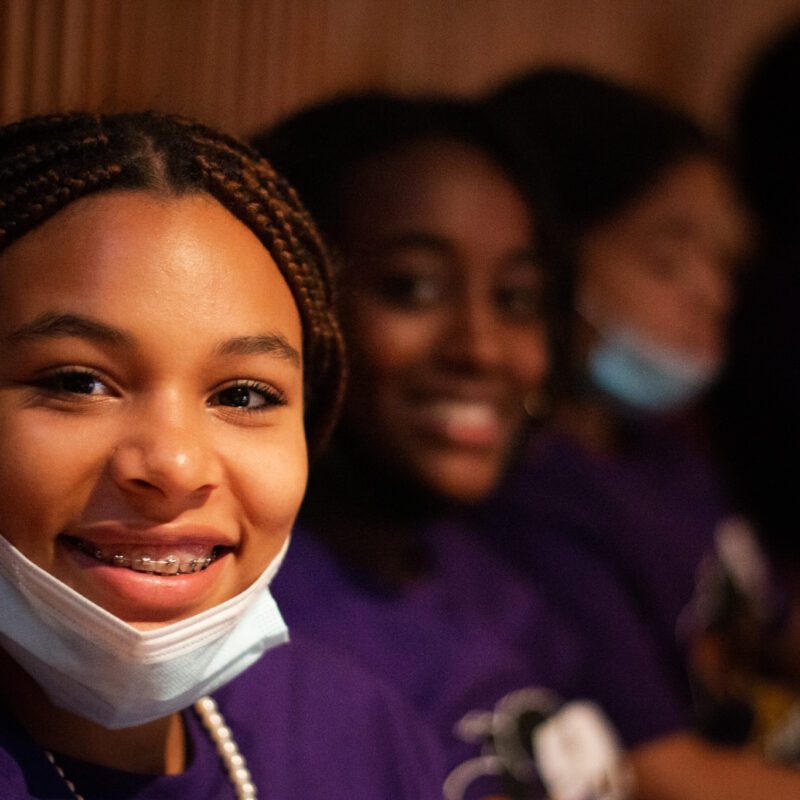 Smiling girl at Black Girl Magic Conference