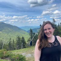 A photo of MCF's new Accountant, Beth Hedges, on a hike in the mountains.