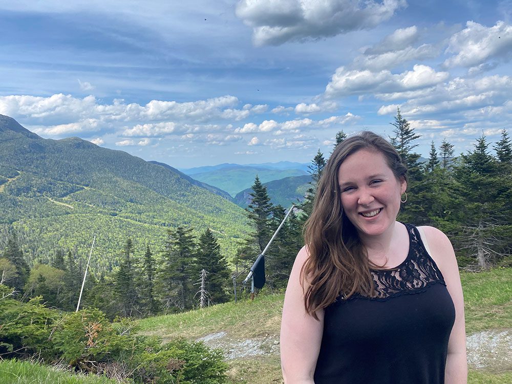 A photo of MCF's new Accountant, Beth Hedges, on a hike in the mountains.