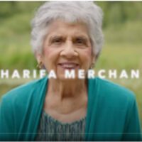 video still of Sharifa Merchant in the Pheasant Branch prairie with her name superimposed over the photo