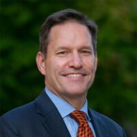 Outdoor headshot photo of MCF's President and CEO, Bob Sorge