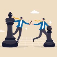 An illustration of two people standing on chess pieces passing a baton from one to the other.