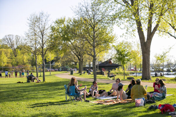 Group of friends hanging out at the park