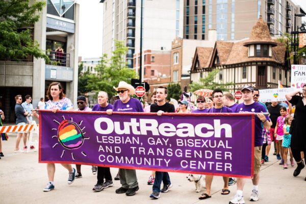 Pride parade banner for OutReach LGBTQ+ Community Center