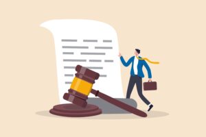 Cartoon man next to a gavel and piece of paper representing a will or legal document