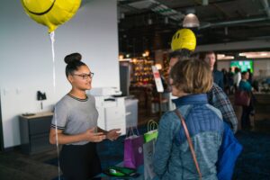 young woman gives sales pitch 