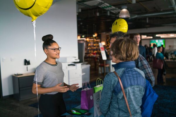 young woman gives sales pitch