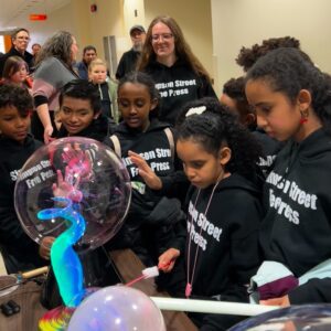 group of kids exploring the static electricity