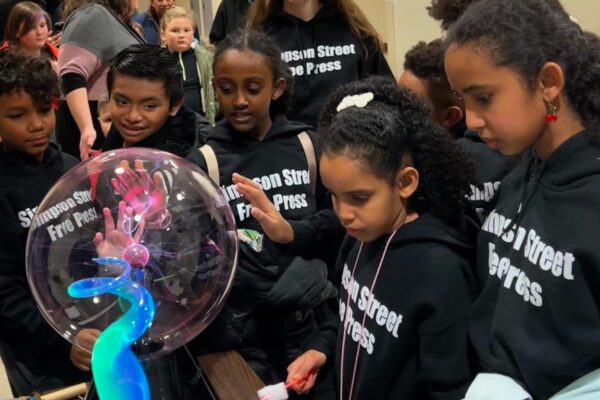 group of kids exploring the static electricity