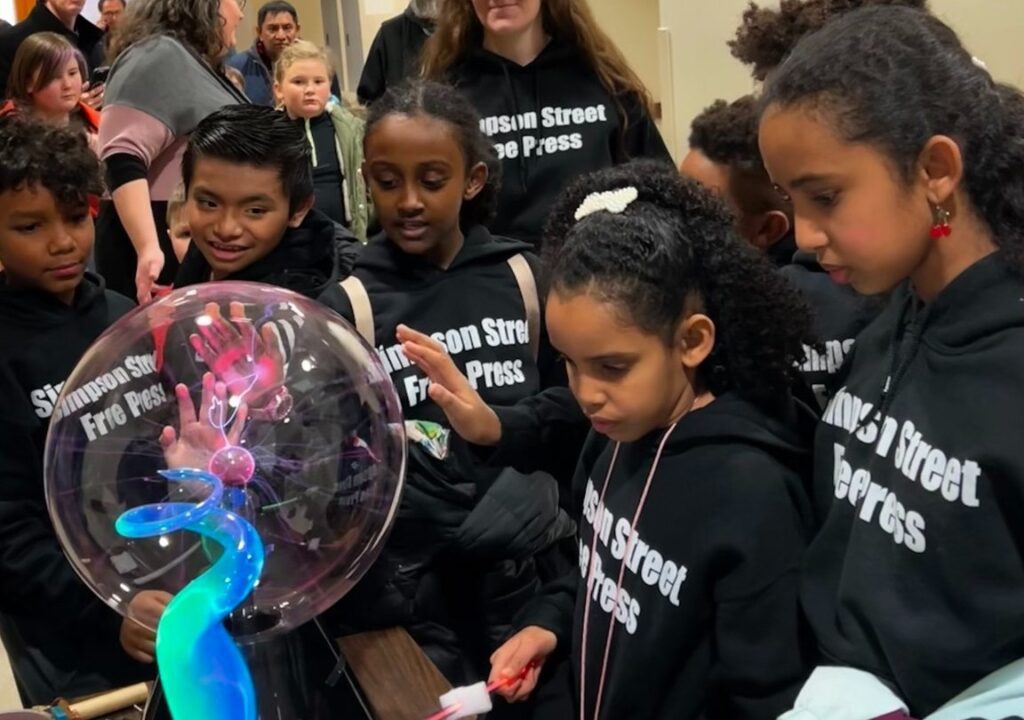 A group of kids learn about static electricity